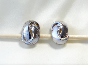 Thick modern silver knot clip on earrings RENTAL