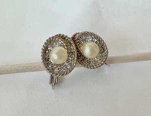 Round pearl nested in rhinestones Signed, clip on earrings  RENTAL