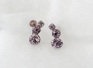 Graduated pale pink rhinestones on screw back earrings RENTAL