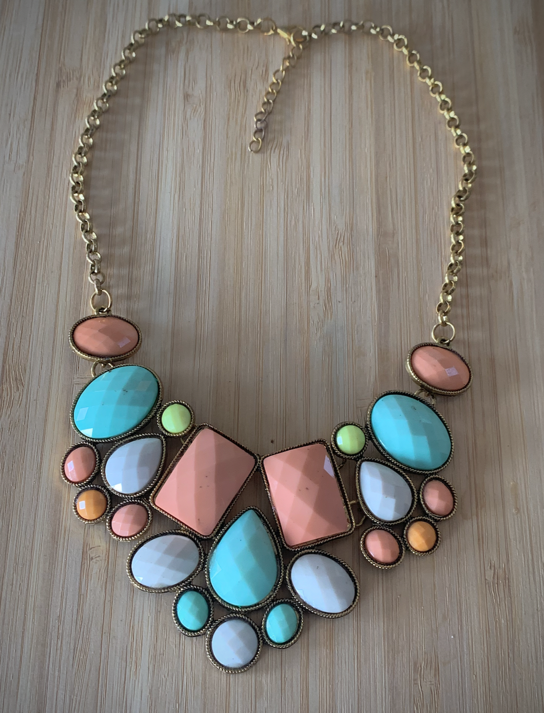 Pastel pink, blue/green, white bib necklace in gold RENTAL