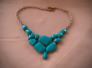 Turquoise facetted random shaped pieces on gold necklace RENTAL