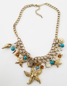 Starfish shells beads turquoise & umber on gold necklace RENTAL