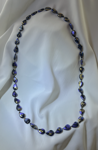 Teardrop shaped plastic beads in blue, black and gold necklace RENTAL