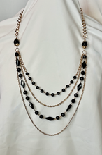 Load image into Gallery viewer, Multi Gold chains with mixed black glass necklace RENTAL
