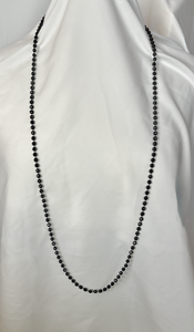 Black facetted round set on cord 44" necklace RENTAL