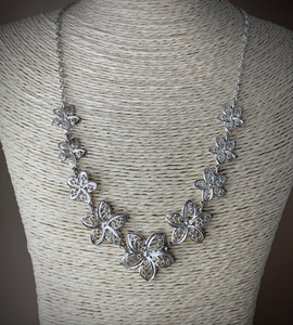 Petite 5 petal graduated flowers in silver chain necklace RENTAL