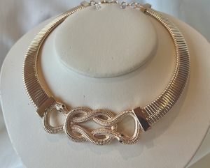 Snake knotted detail on wide golden band choker RENTAL