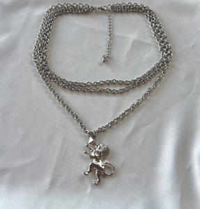 Silver 3 chain w/ Upright lion with a diamond box RENTAL