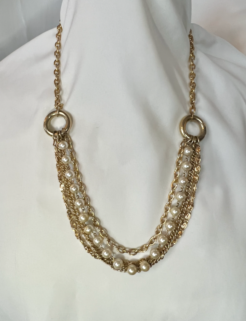 4 chains, one w/ pearls suspended from circles, necklace RENTAL