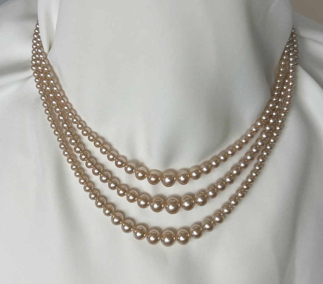 Tapered warm toned glass triple strand pearl necklace RENTAL