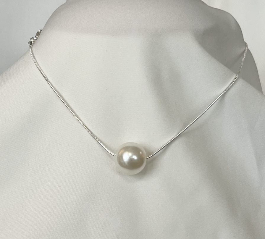 Large pearl suspended on a silver snake chain necklace RENTAL