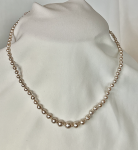 Graduated warm coloured pearl, hand knotted necklace RENTAL