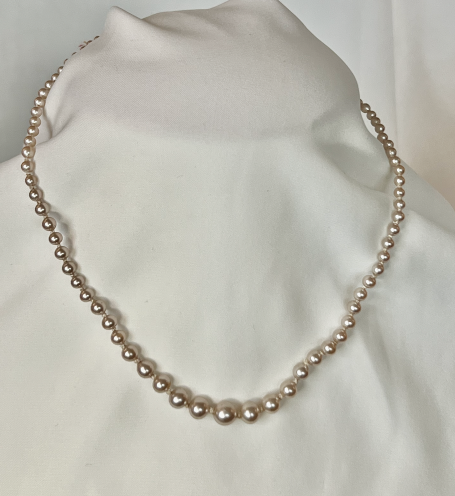 Graduated warm coloured pearl, hand knotted necklace RENTAL