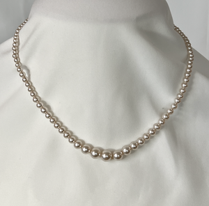 Vintage graduated warm coloured pearl necklace RENTAL