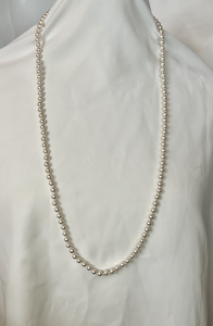 Long single strand of warm pearls,hand knotted necklace RENTAL