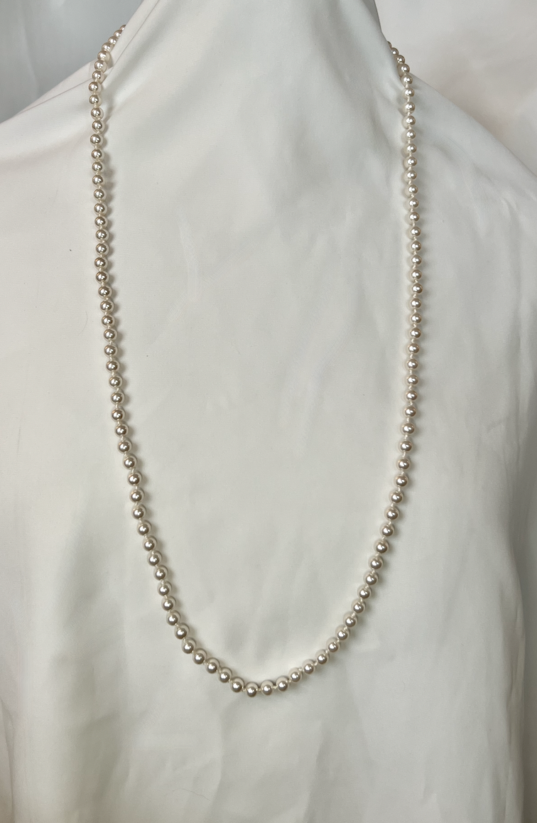 Long single strand of warm pearls,hand knotted necklace RENTAL