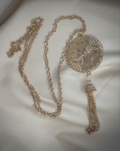 Gold chain 1970s cut out circle & tassel end necklace RENTAL