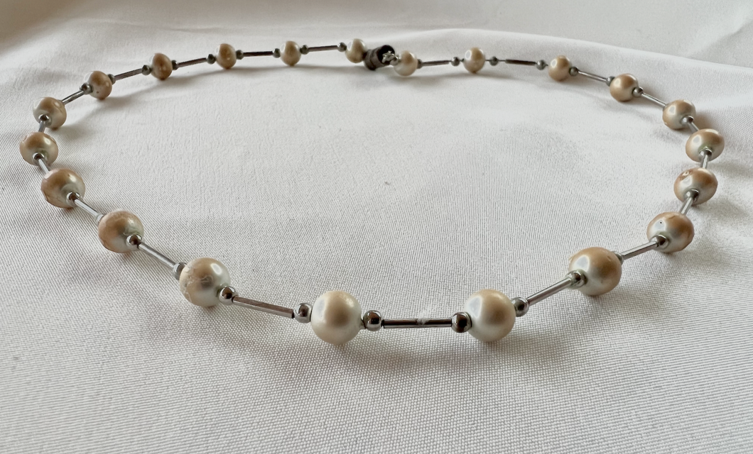 Pearl and long silver beads on 16