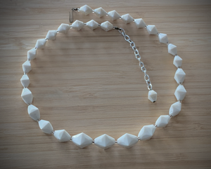 Camera white tapered necklace w/ diamond shaped long beads RENTAL