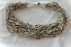 Dozens of glass bead strands w/white, blue, and GREEN necklace RENTAL